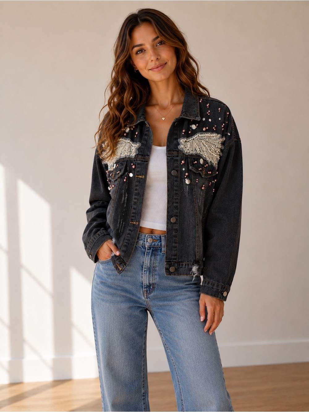 Blue B Collection angel wing denim jacket with beaded and pearl embellishments